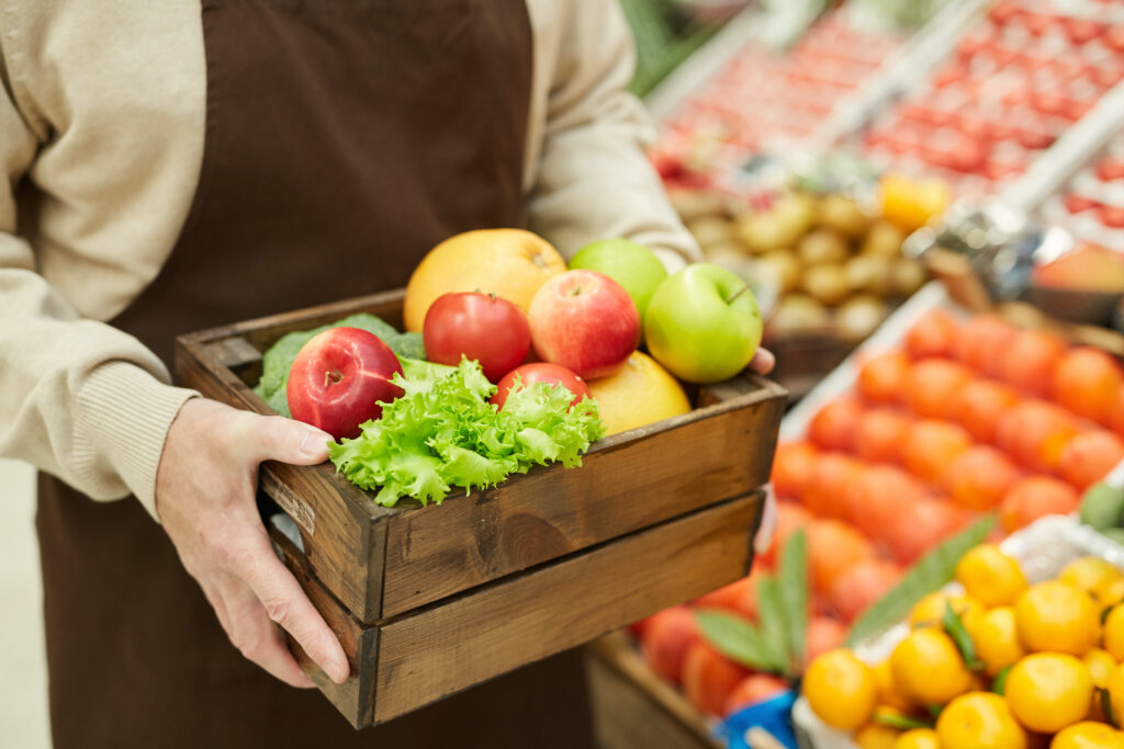 Man Holding Box Of Fresh Fruit 551913 | Planeta Campo